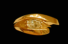 This is the Open Wave Ring in 14K Yellow Gold with a fine .58 Carat Oval Cut Diamond... other versions with different stones and sizes are available and are individually priced